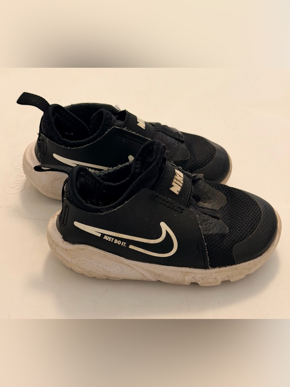 Nike Kids Black and White Slip-On Sneakers